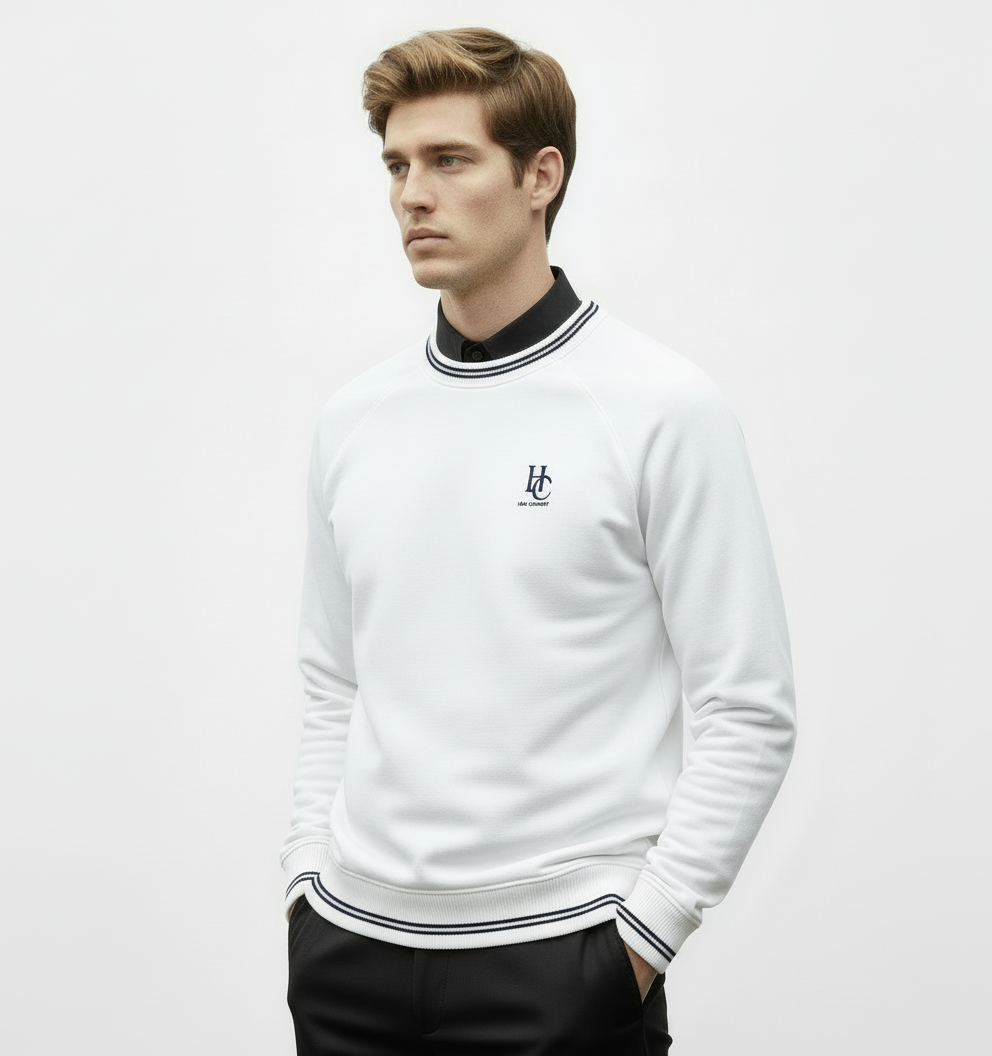 Model wearing white HC sweatshirt with black oxford collar